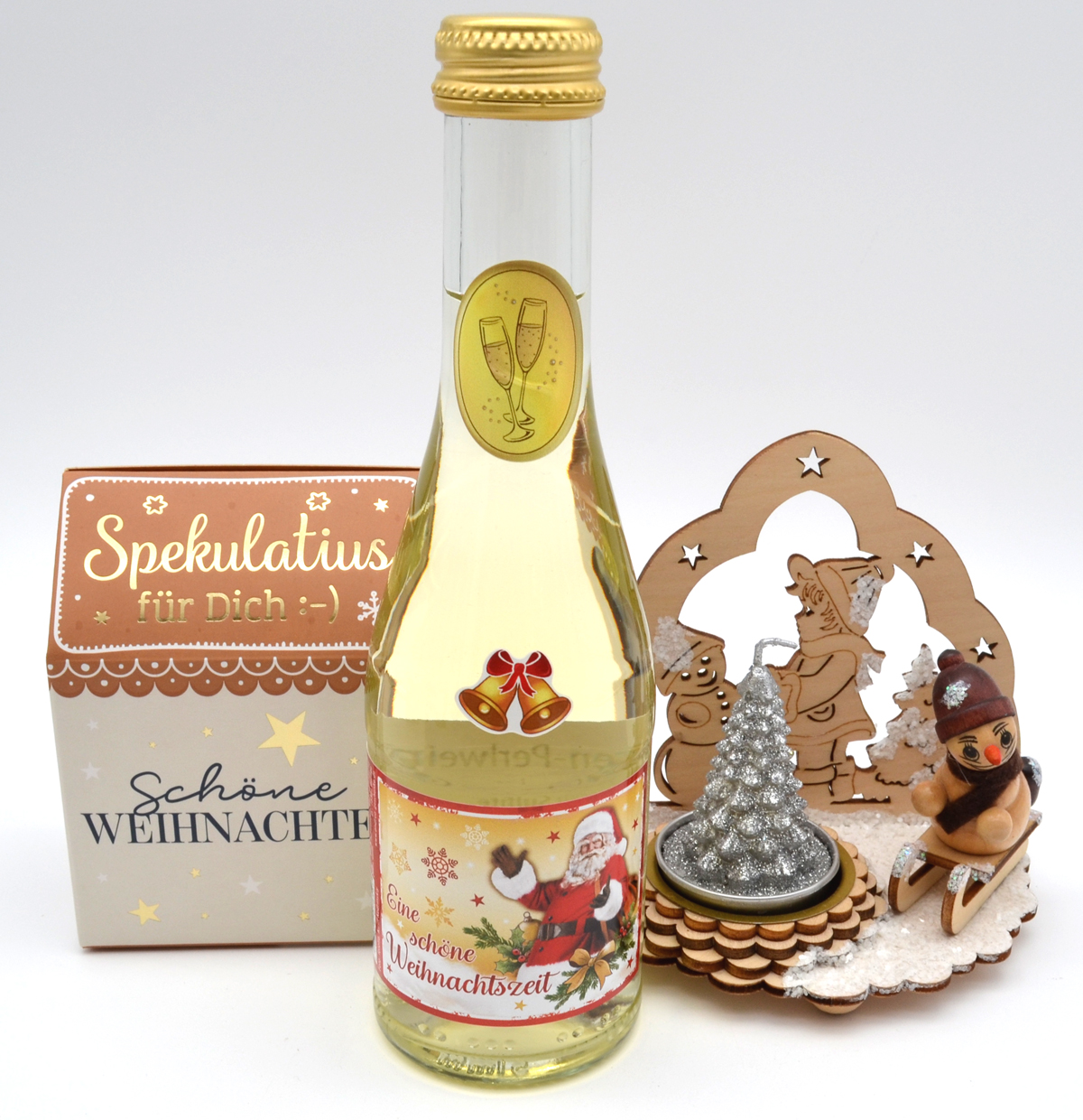 Fertig verpacktes Weihnachtspräsent mit Perlwein & Spekulatius