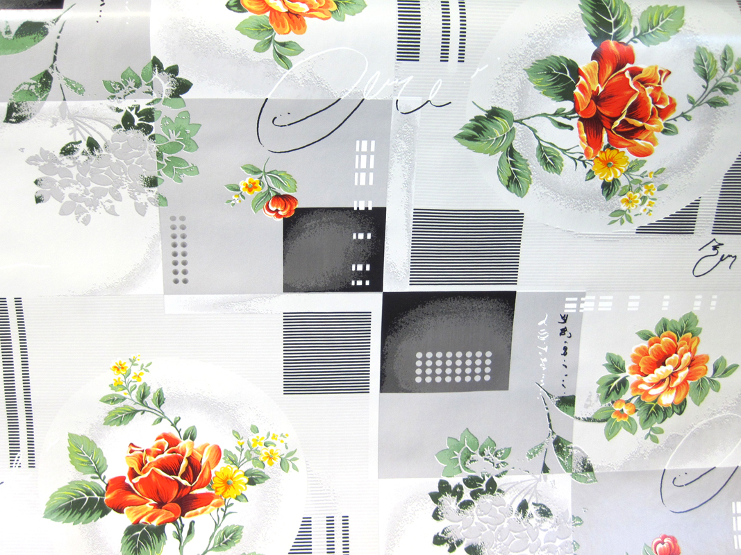 Wachstuch von der Rolle 140 breit Blume auf grauen Kästchen Meterware