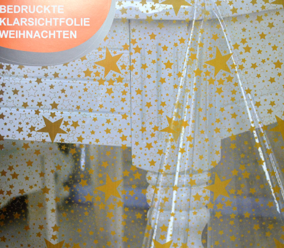 Glasklar-Tischfolie Sterne Gold von der Rolle 130 breit Meterware
