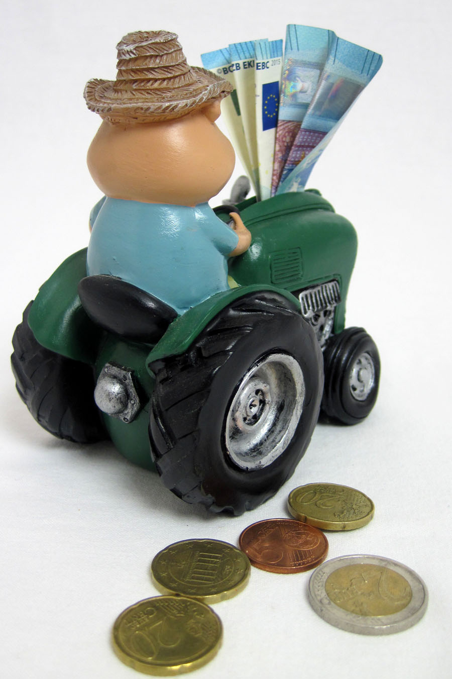 Spardose Mann auf Traktor Nostalgie, mehrfarbig, ca. 12 cm hoch