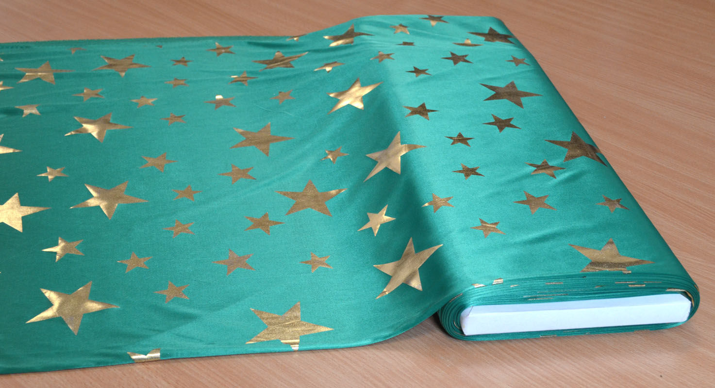 Knitterfreier Dekostoff 112 breit Weihnachten grün mit Sternen Meterware