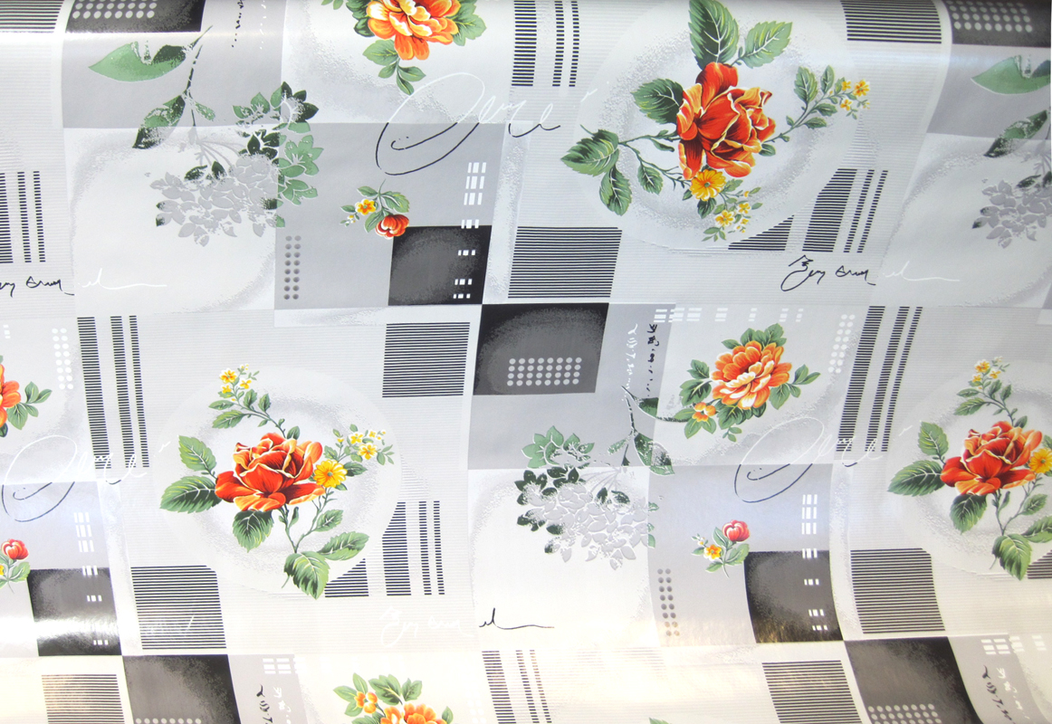 Wachstuch von der Rolle 140 breit Blume auf grauen Kästchen Meterware