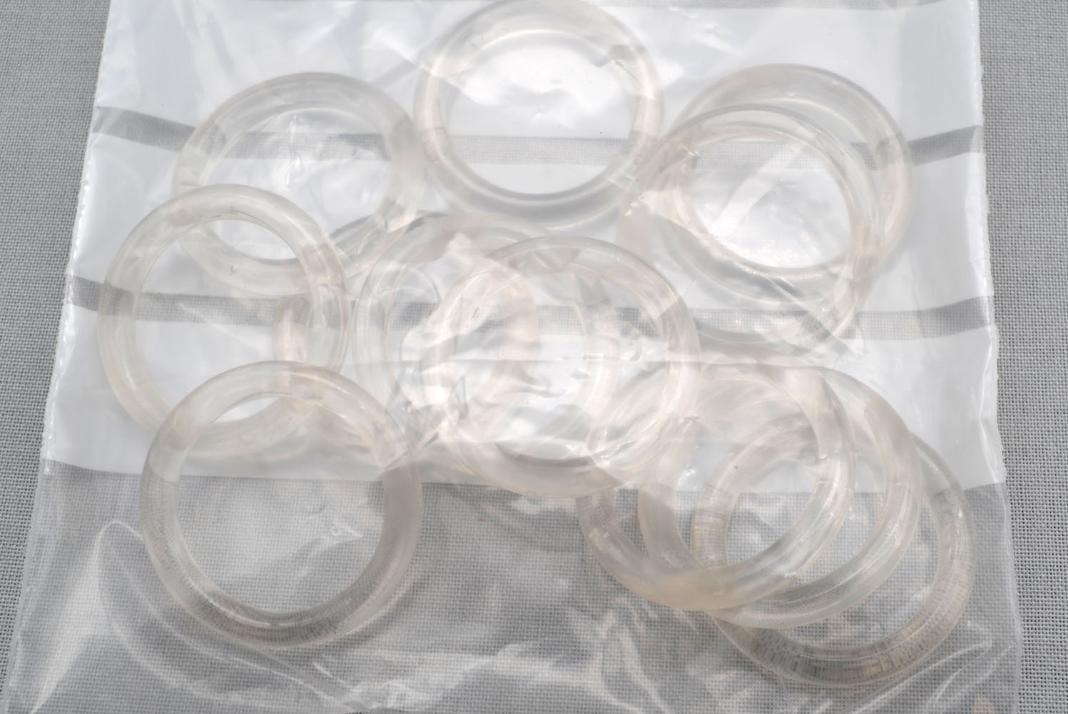 12 Kunststoffringe transparent für Stangen von 16-20 mm